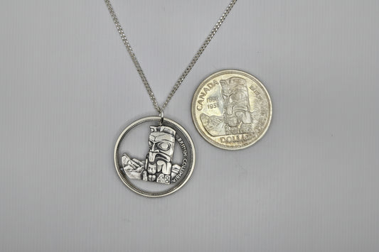 Hand Pierced 1958 BC Centennial Silver Dollar