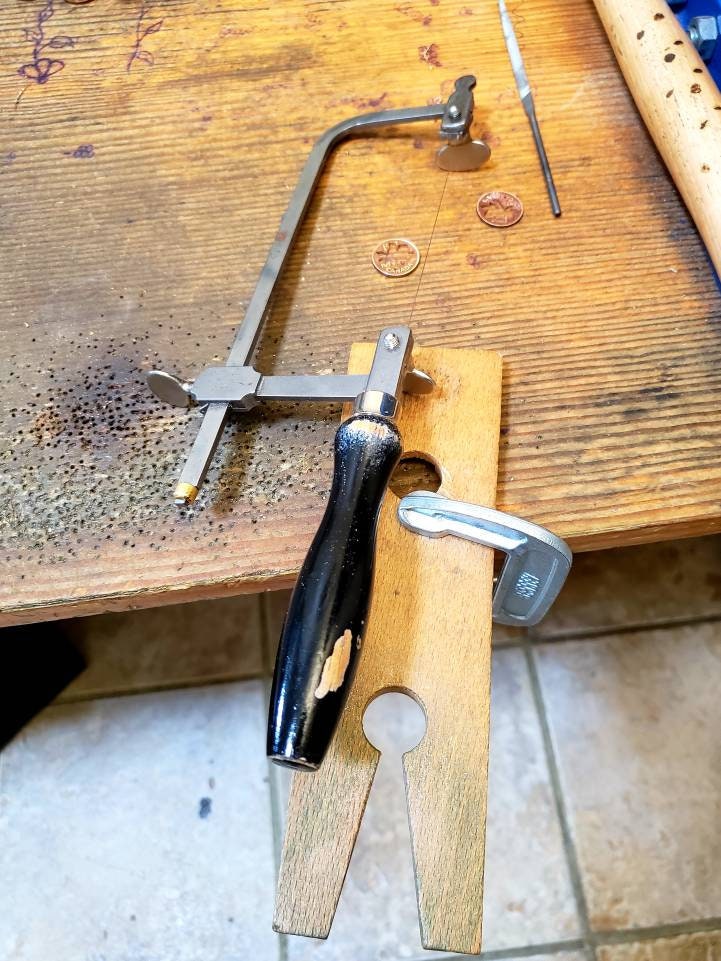 Carved Canadian Silver Quarter