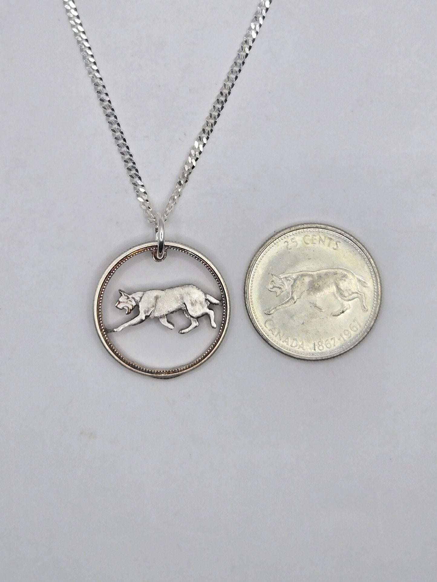 Hand Cut 1967 Canadian Centennial Quarter