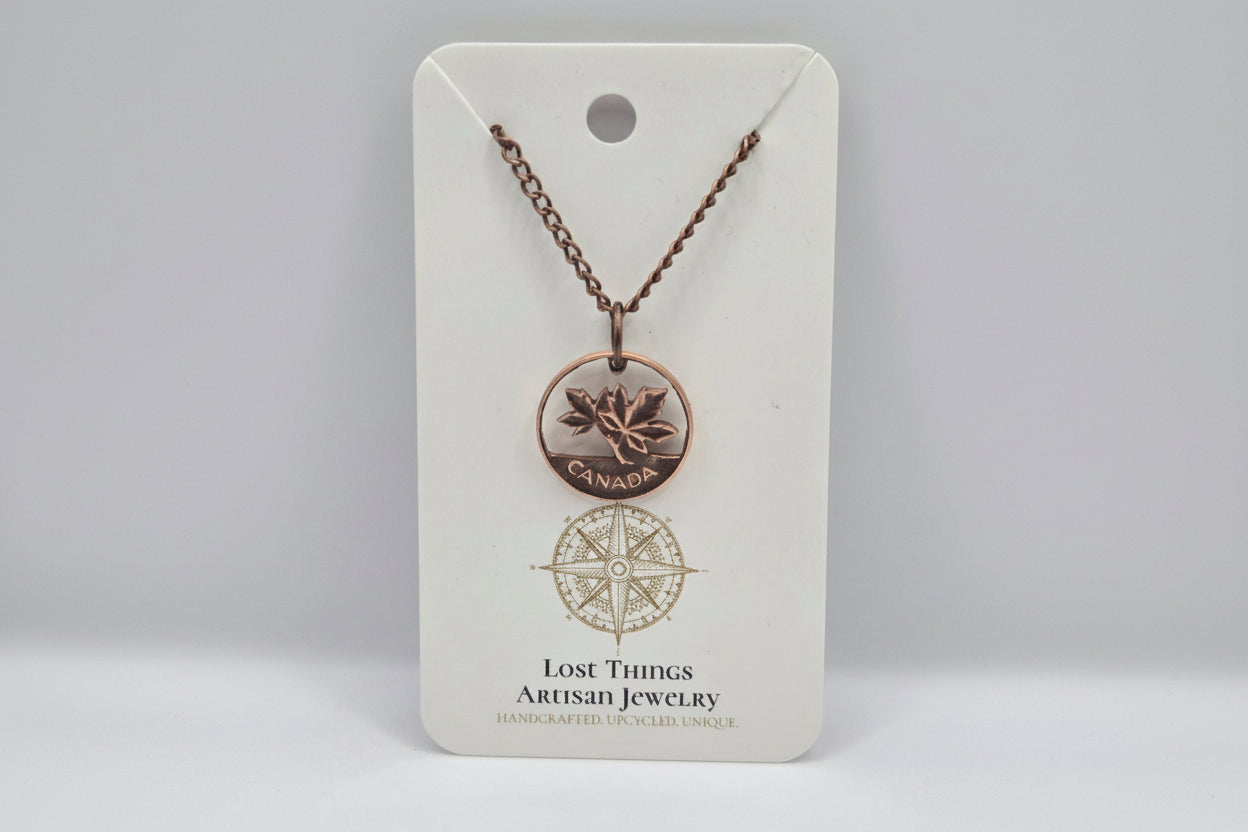 Hand Carved Canadian Pennies