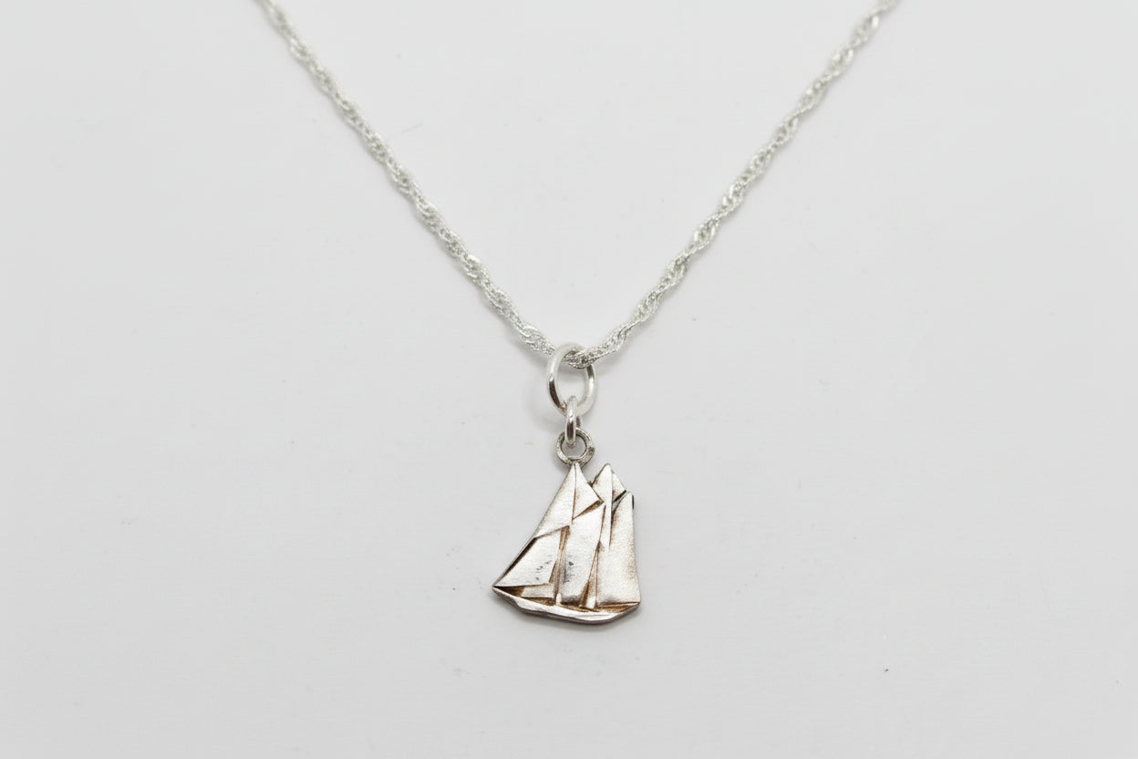 Hand Cut Canadian Silver Dime Pendant