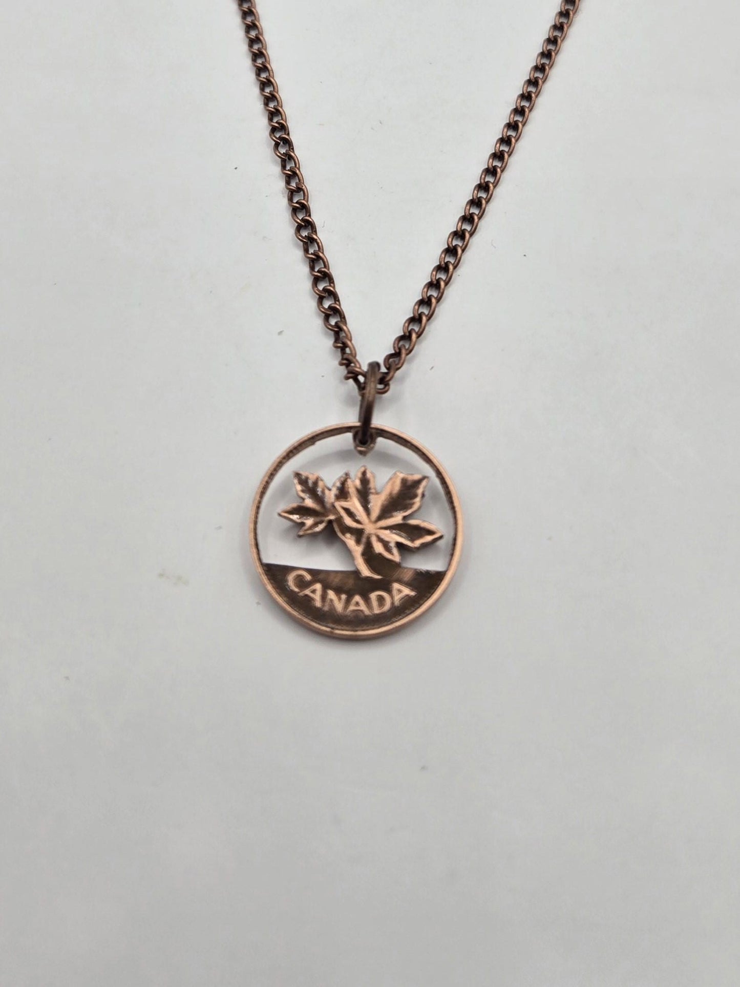 Hand Carved Canadian Pennies