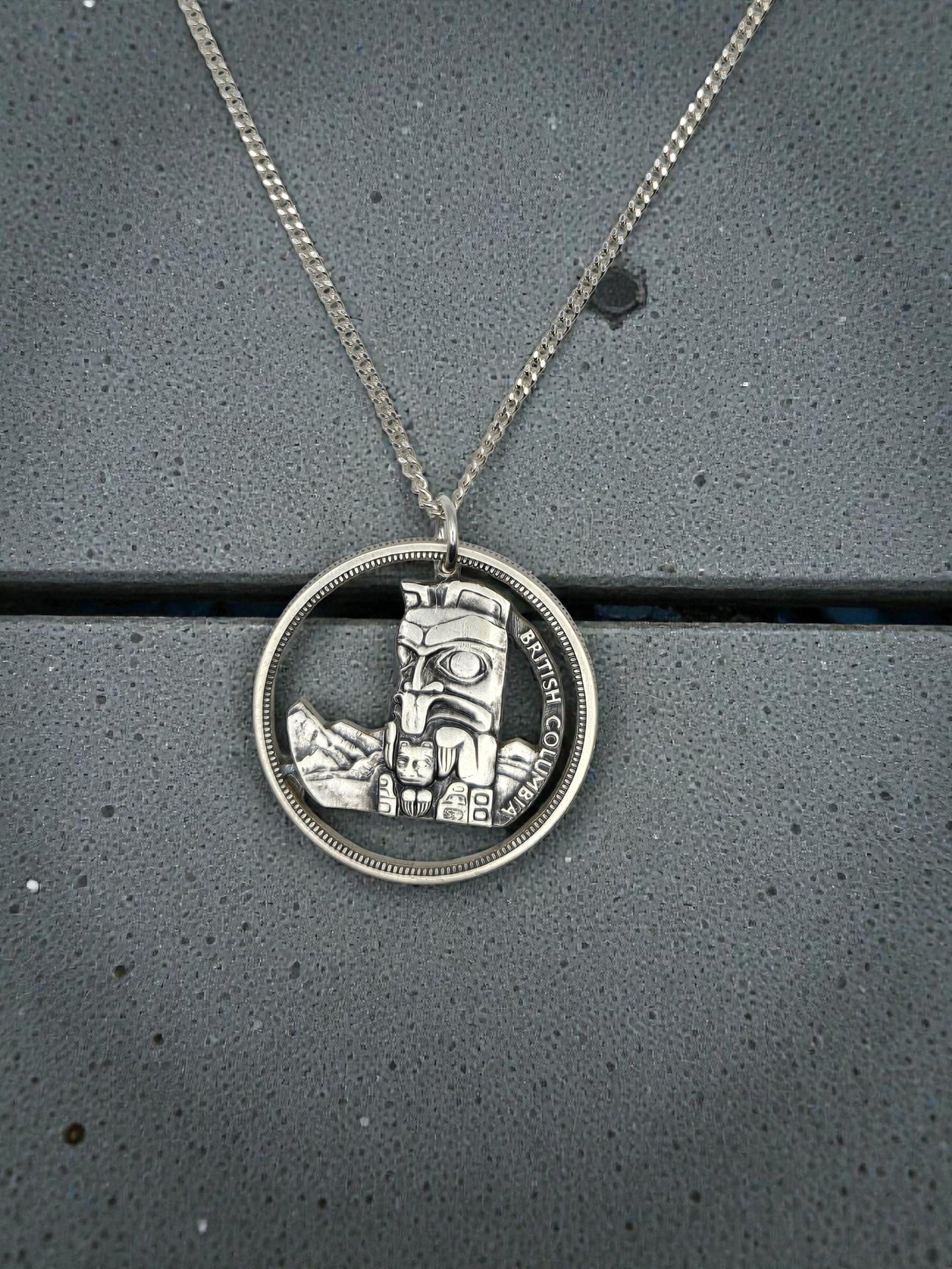 Hand Pierced 1958 BC Centennial Silver Dollar