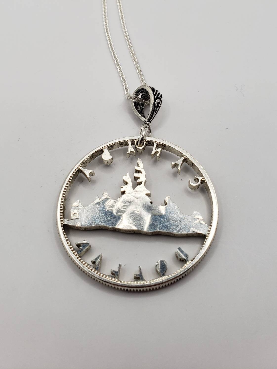 Hand Cut Canadian Silver Dollar Necklace