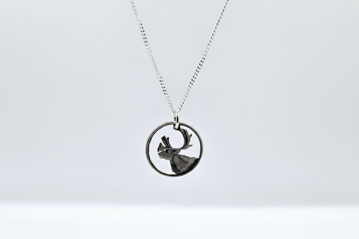 Carved Canadian Silver Quarter