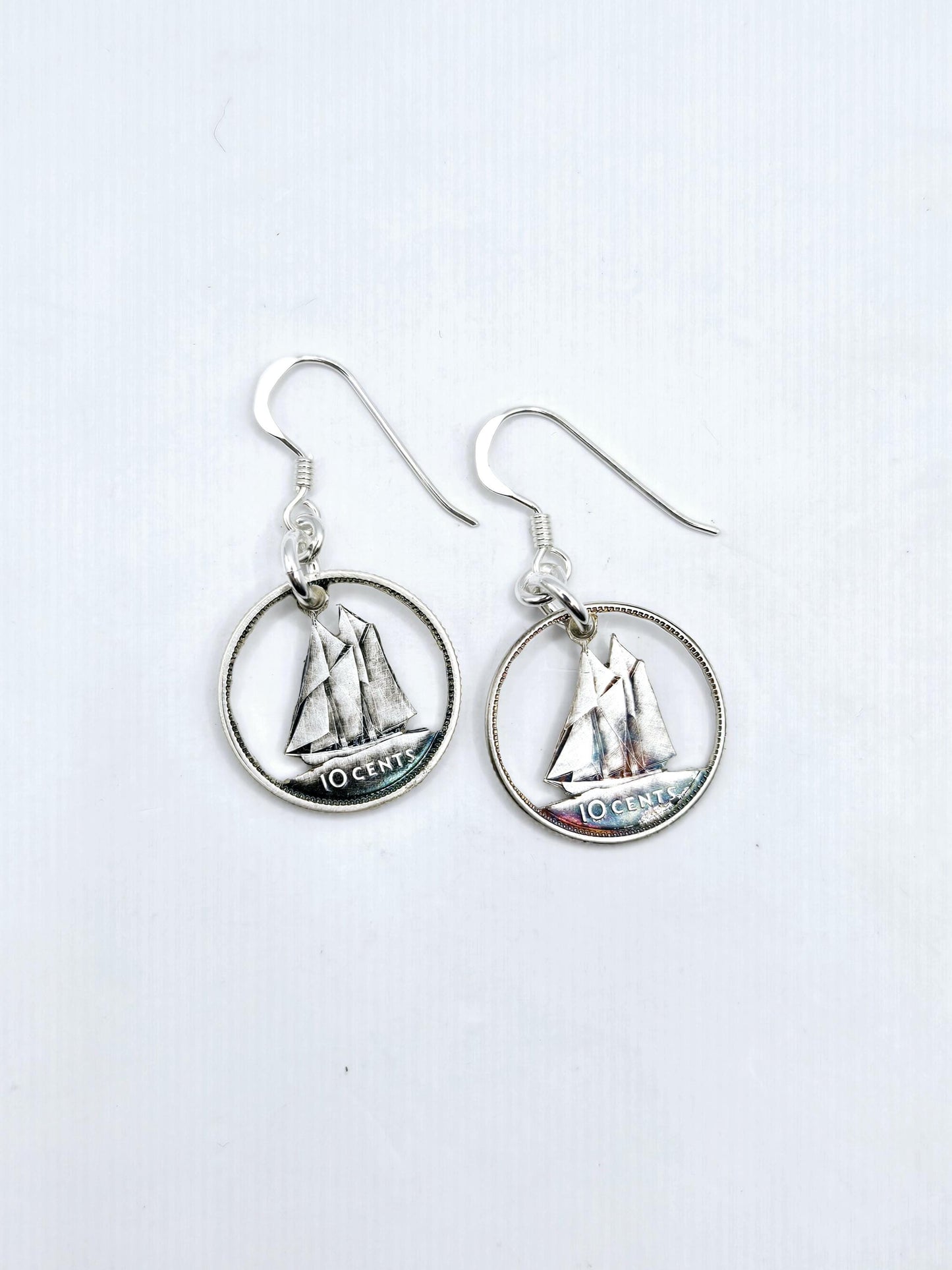 Carved Canadian Silver Dime Earrings.