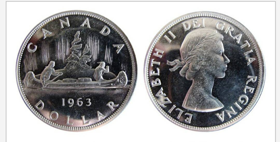 Hand Cut Canadian Silver Dollar Necklace