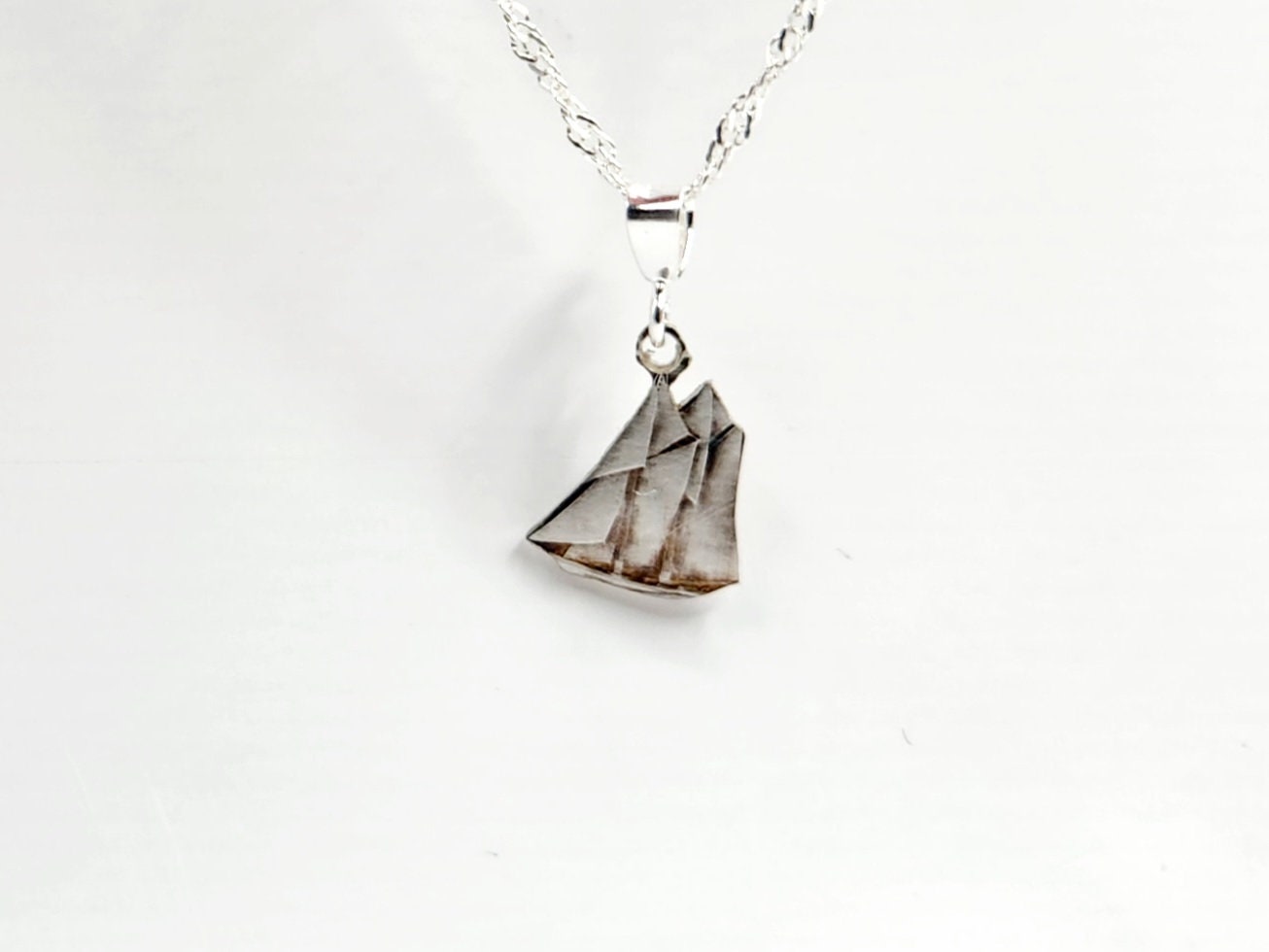 Hand Cut Canadian Silver Dime Pendant