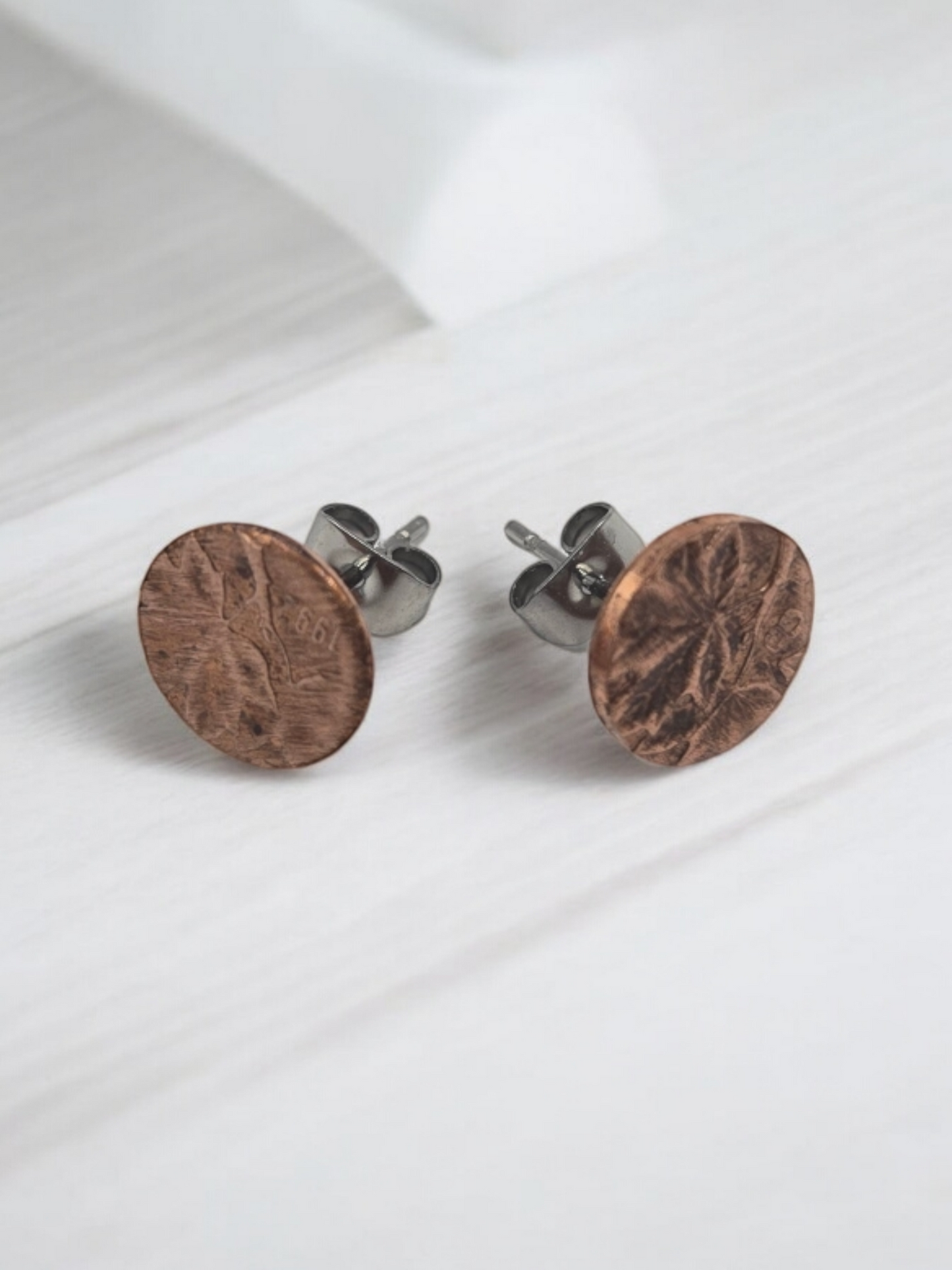 stud earrings handmade from old canadian penny