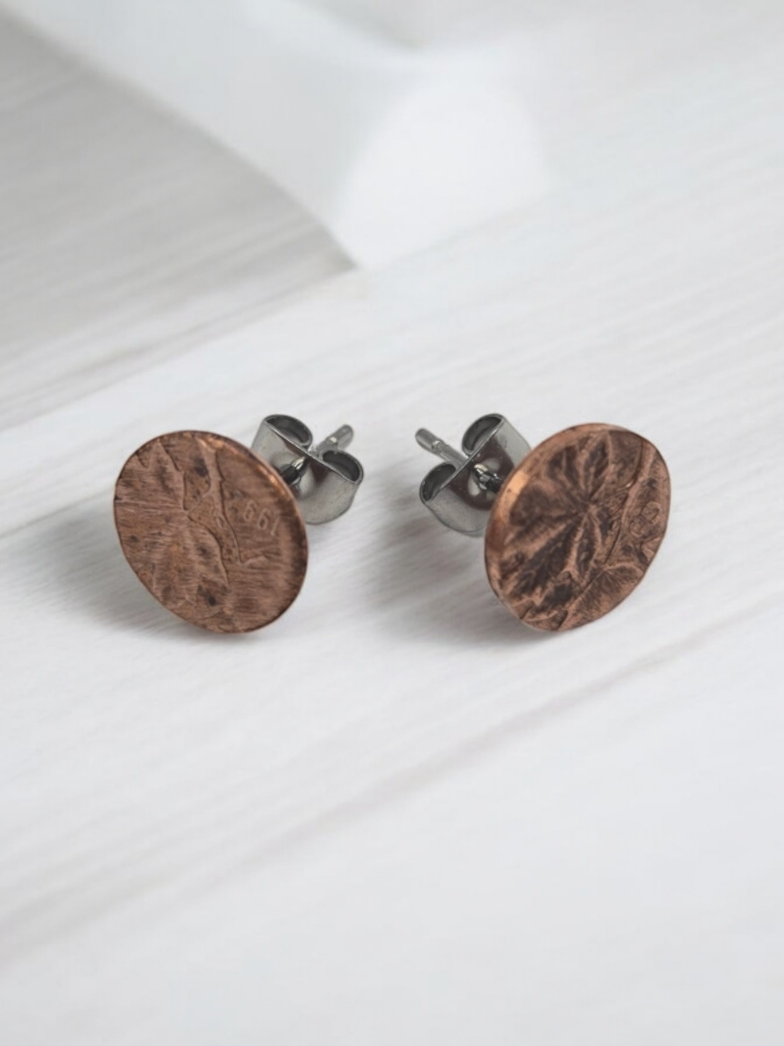 stud earrings handmade from old canadian penny